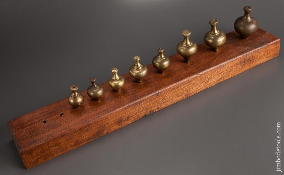Graduated Collection of Eight Brass Plumb Bobs - 78763