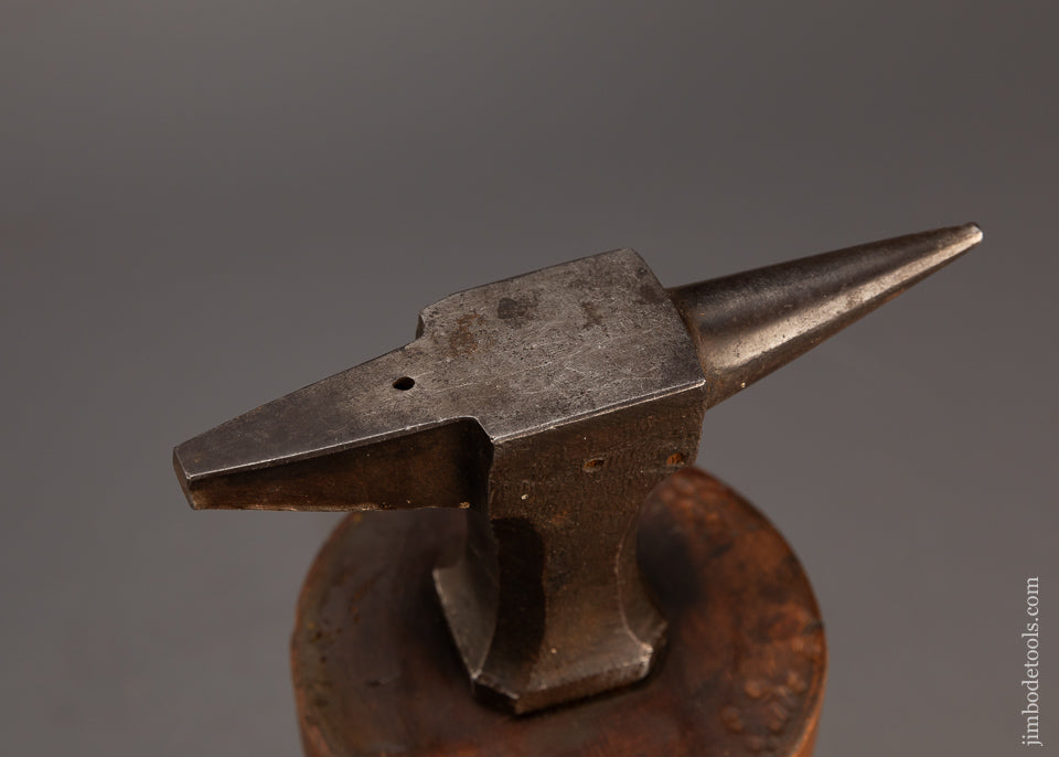 Cool-Watchmaker’s-Anvil-on-Fancy-Stump-118901