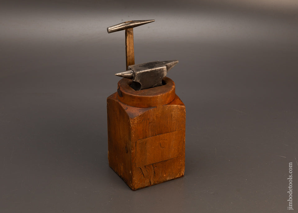 Jeweler’s-Anvil-with-Hammer-on-Stump-118920