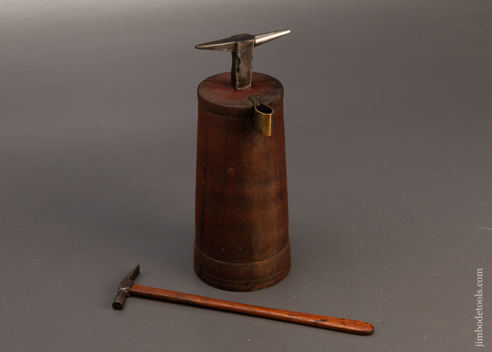 Cool-Watch-Maker’s-Anvil-&-Hammer-on-Turned-Stump-118950