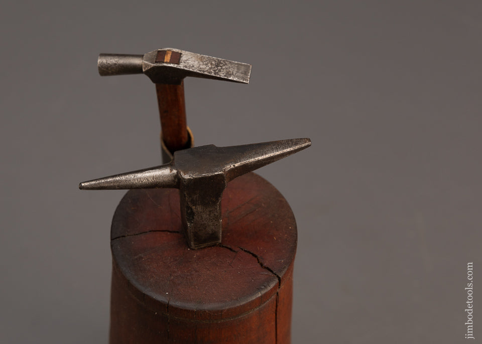 Cool-Watch-Maker’s-Anvil-&-Hammer-on-Turned-Stump-118950