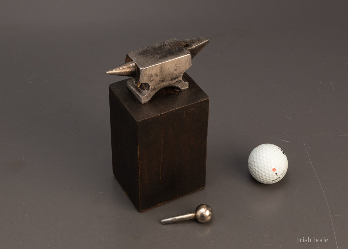 Cool-Watch-Maker’s-Anvil-Mounted-on-Stump-118962