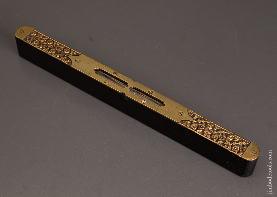 Stunning-Ebony-&-Brass-Repousse-Level-121295