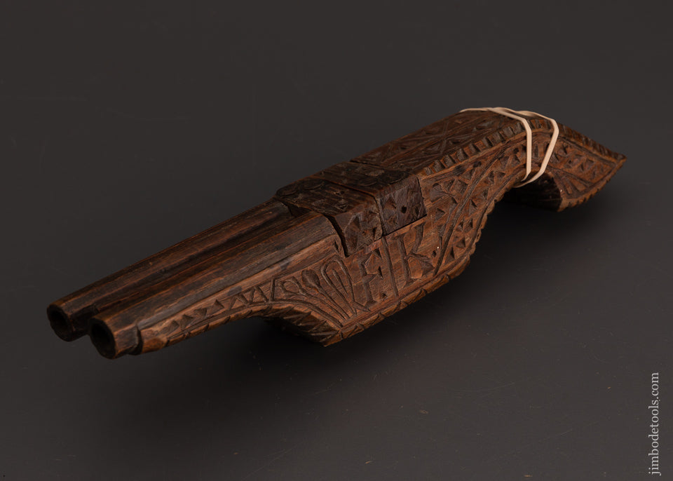 Carved and Dated 1887 Boot Jack Shaped Like Pistols - 102888