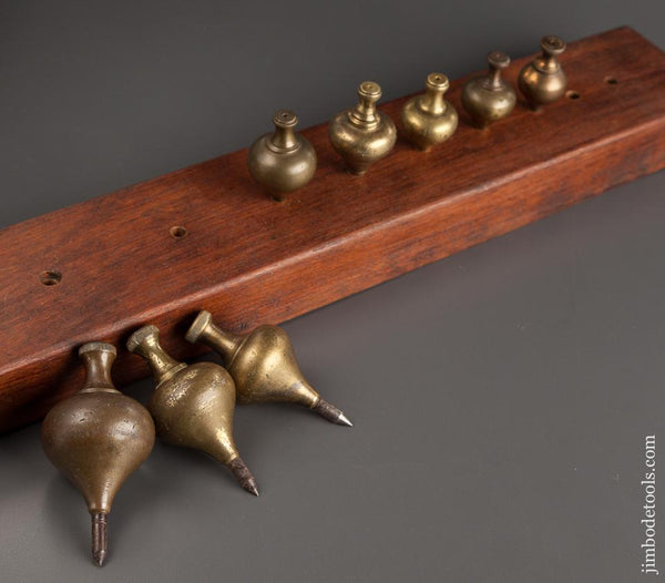 Graduated Collection of Eight Brass Plumb Bobs - 78763