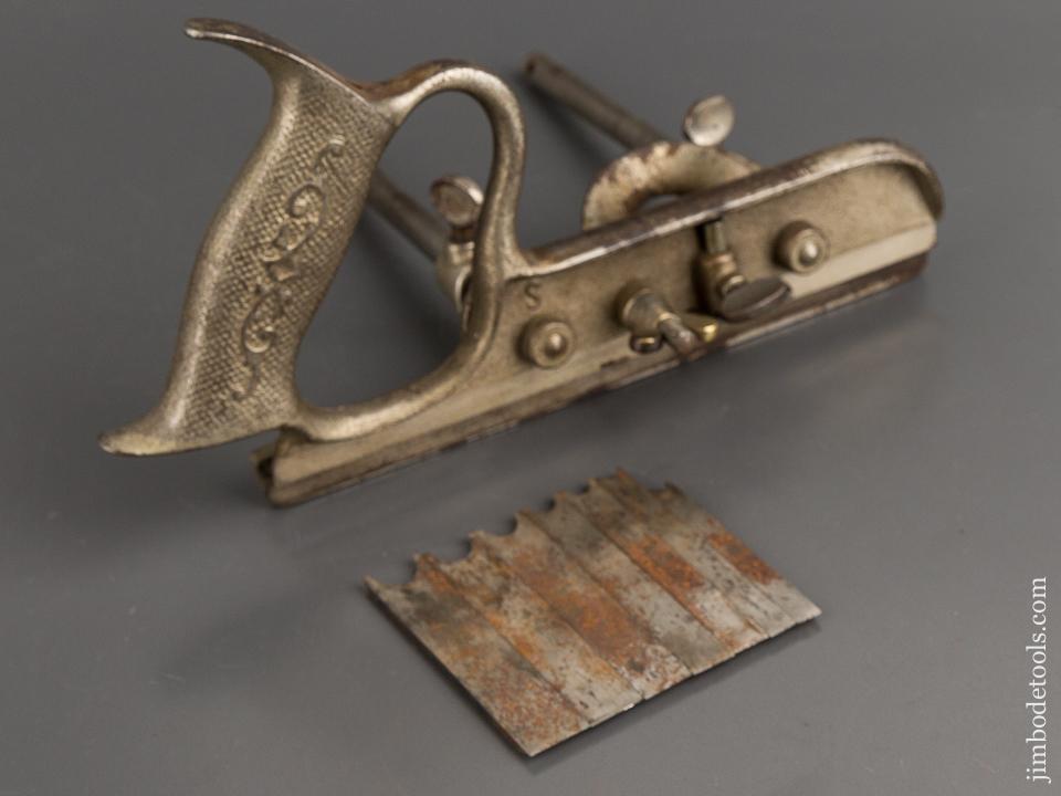 Early STANLEY No. 50 Light Combination Plow Plane with Stop and Seven Double Ended Irons - 81831
