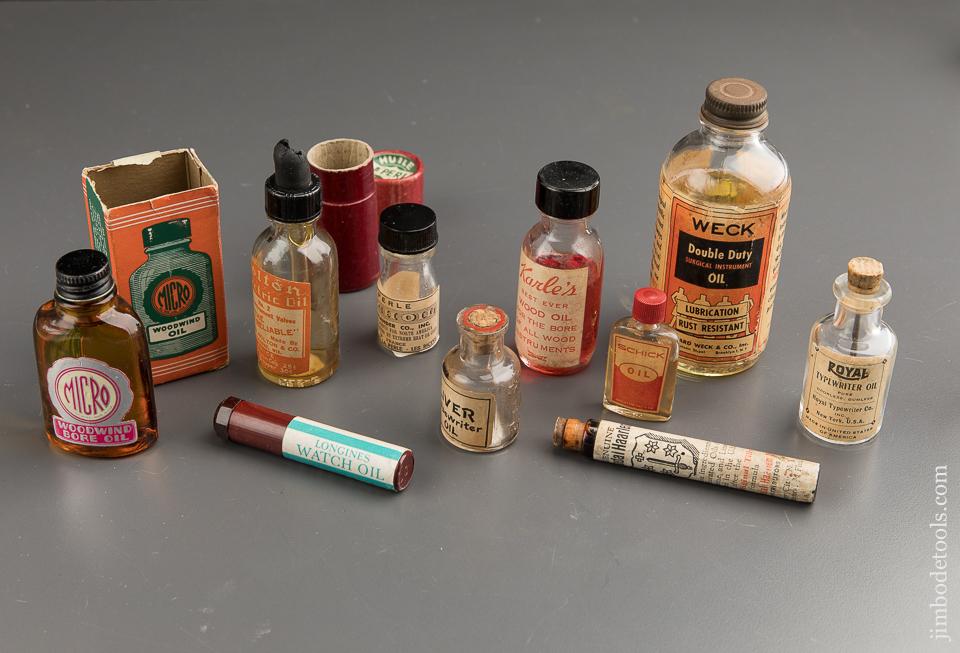 Nine Vintage Glass Oil Bottles - 87991