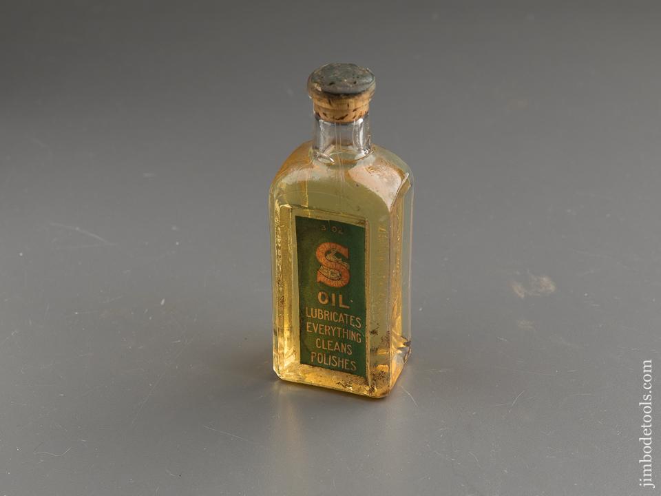 Three Ounce UNOPENED Bottle of SINGER SEWING MACHINES Oil - 87998