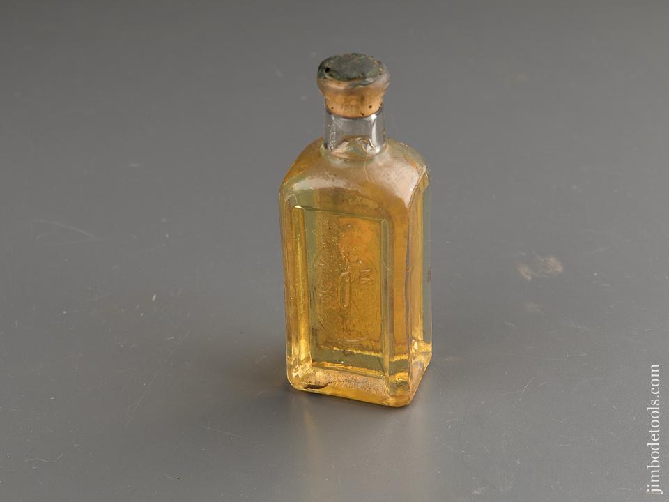 Three Ounce UNOPENED Bottle of SINGER SEWING MACHINES Oil - 87998